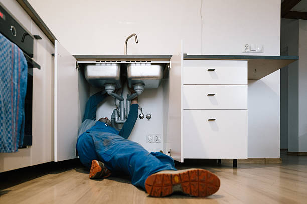 Professional Emergency Plumber technician working in Hebron, NE